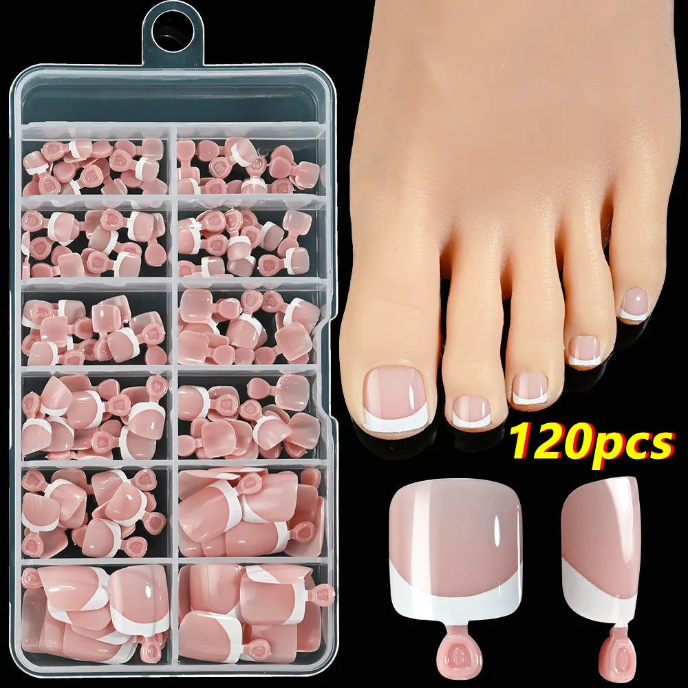 Box of 120 French white edge press-on toe nails in full square short shape showing multiple nude shades.