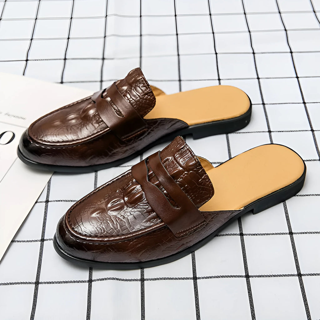 Men's closed toe half-support crocodile pattern PU leather slippers in black, side view