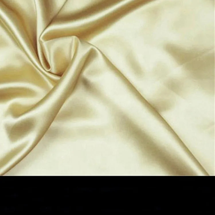 Double-sided silk pillowcase showing reversible design in apricot colour with three size options displayed