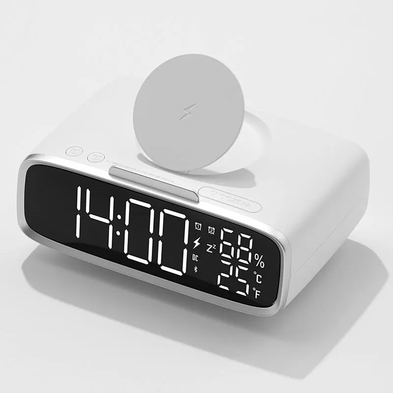 White wireless charger Bluetooth speaker alarm clock with LED night light on bedside table