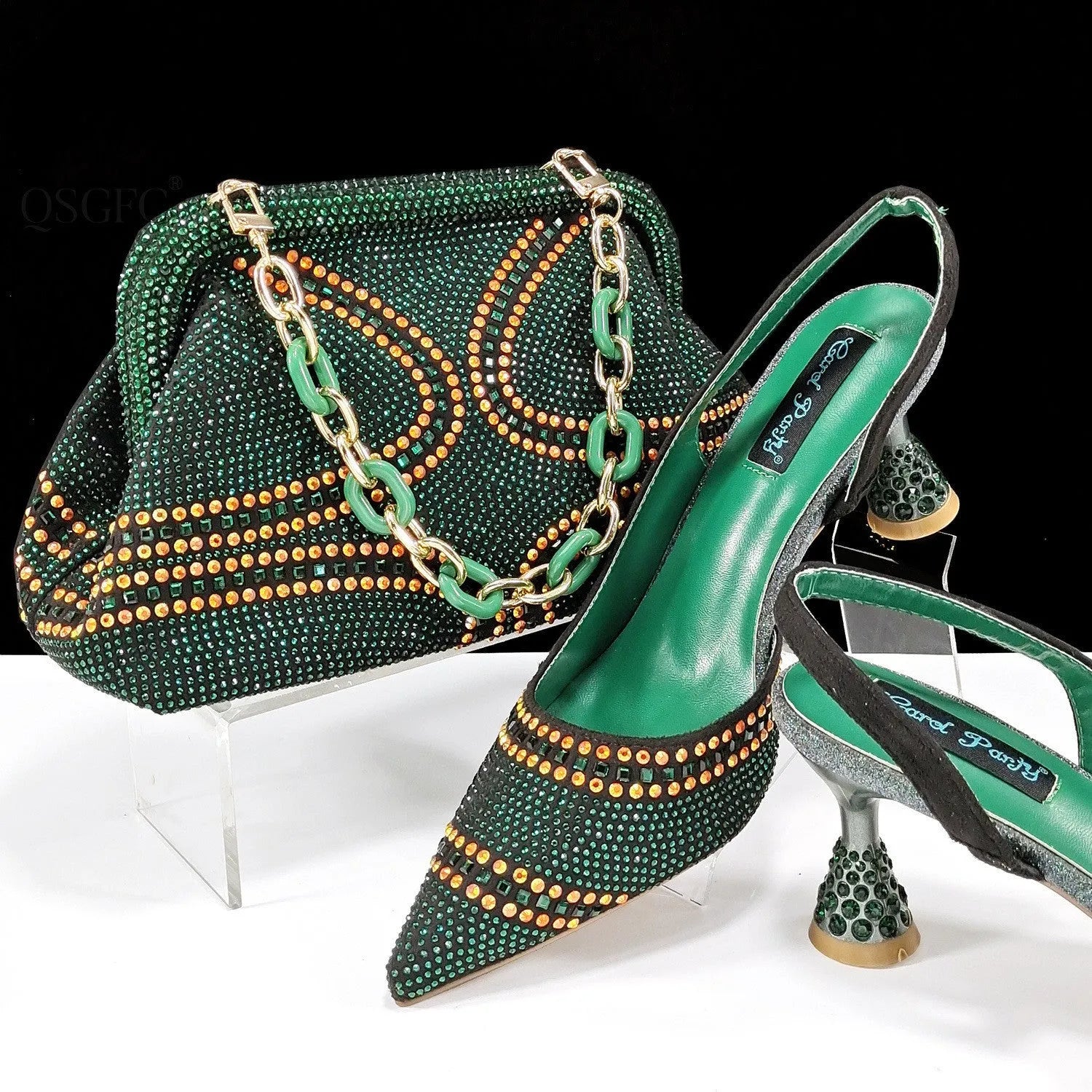 Women's pointed toe high heel shoes with decorative rhinestones and a matching small bag, shown in blue.