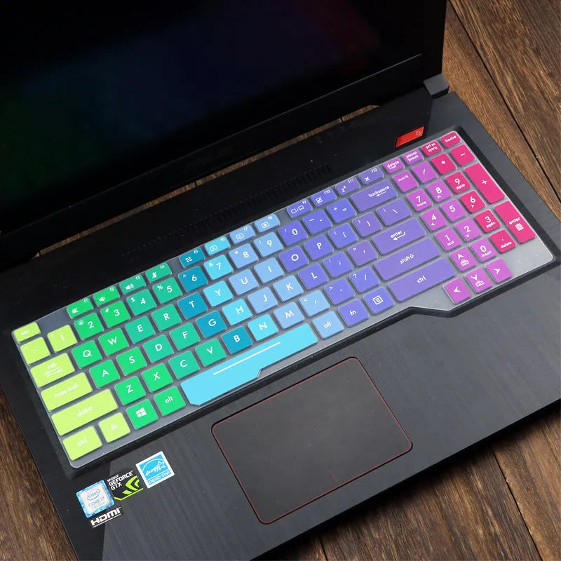 ASUS Flight laptop keyboard protective film cover shown in gradient blue on a laptop