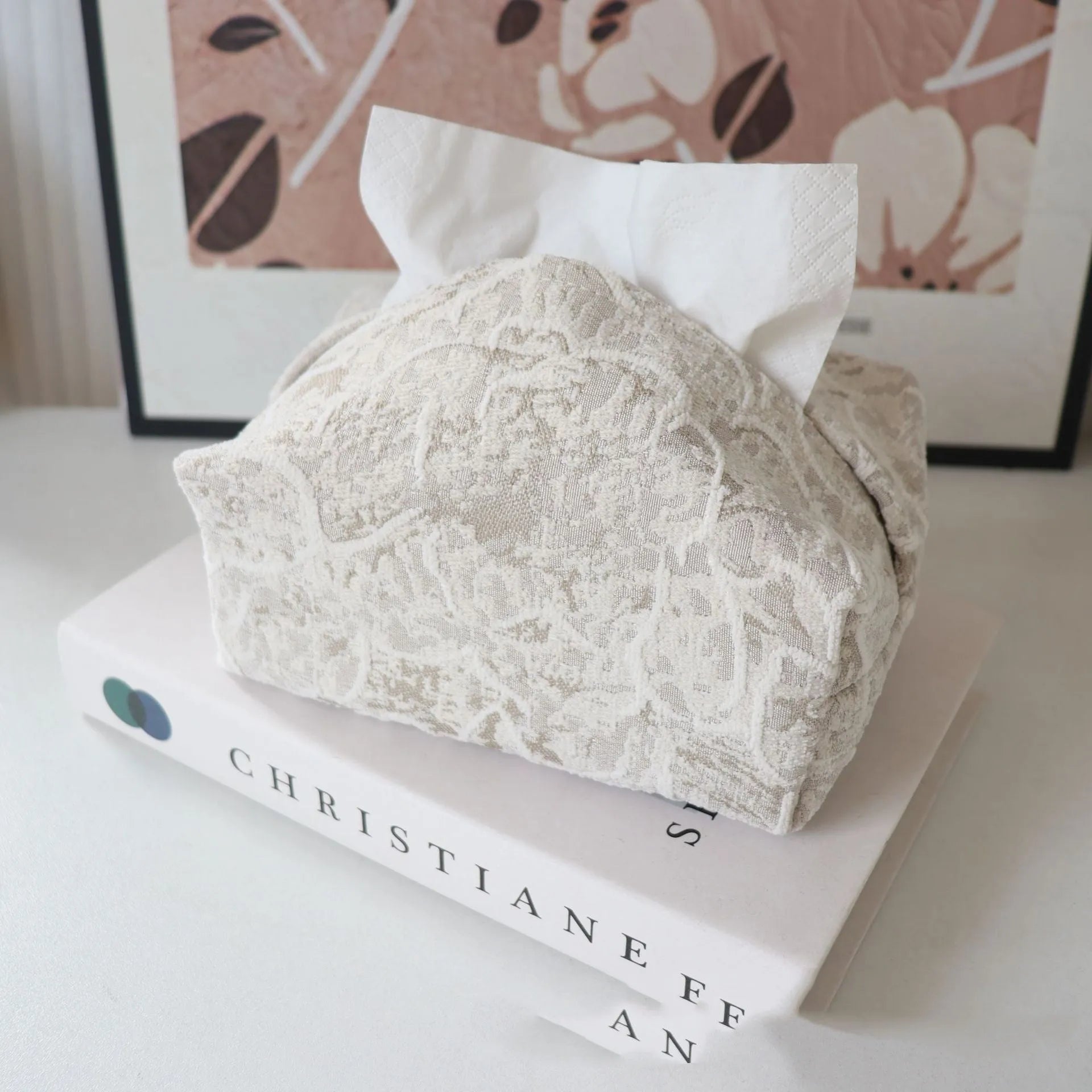 Cotton floral tissue box in beige, blue, or brown on a wooden table.