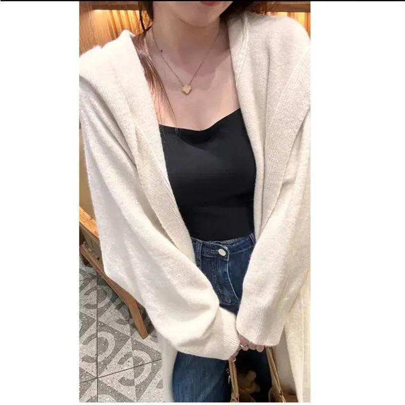 Korean style long hooded knitted cardigan coat for women in a loose free size.