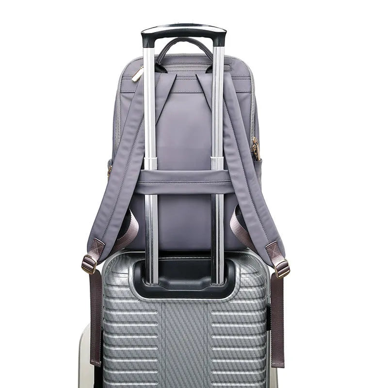 Large black Oxford cloth women's backpack with organisational compartments and a breathable back panel.