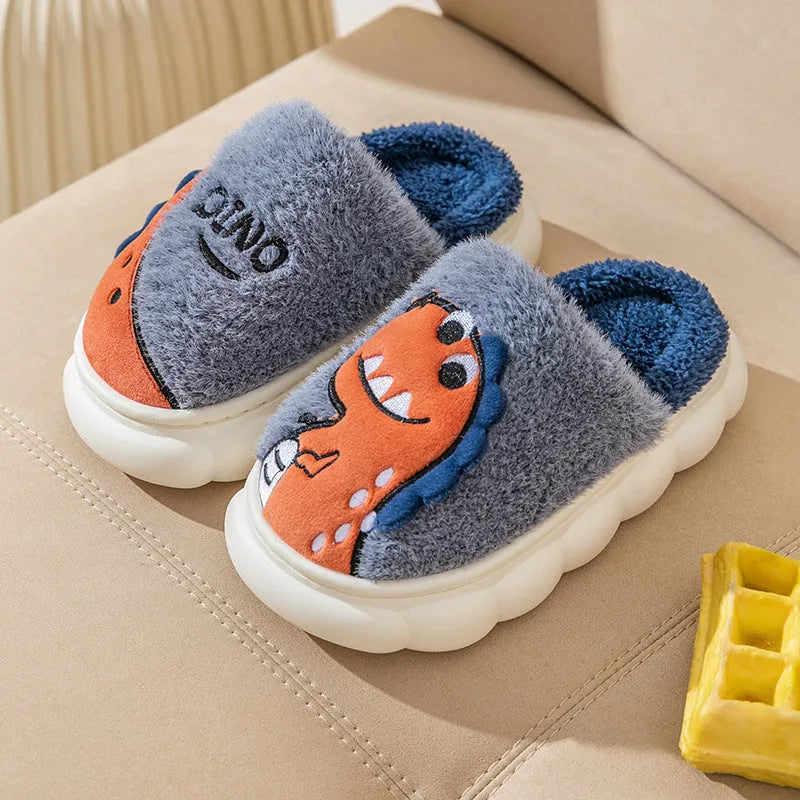 A pair of plush cotton couple slippers with dinosaur designs in coffee, grey, or orange-yellow, shown with a thickened sole.