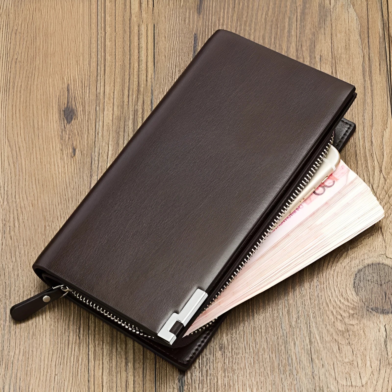Men's black PU leather wallet with a long silver zipper, closed.