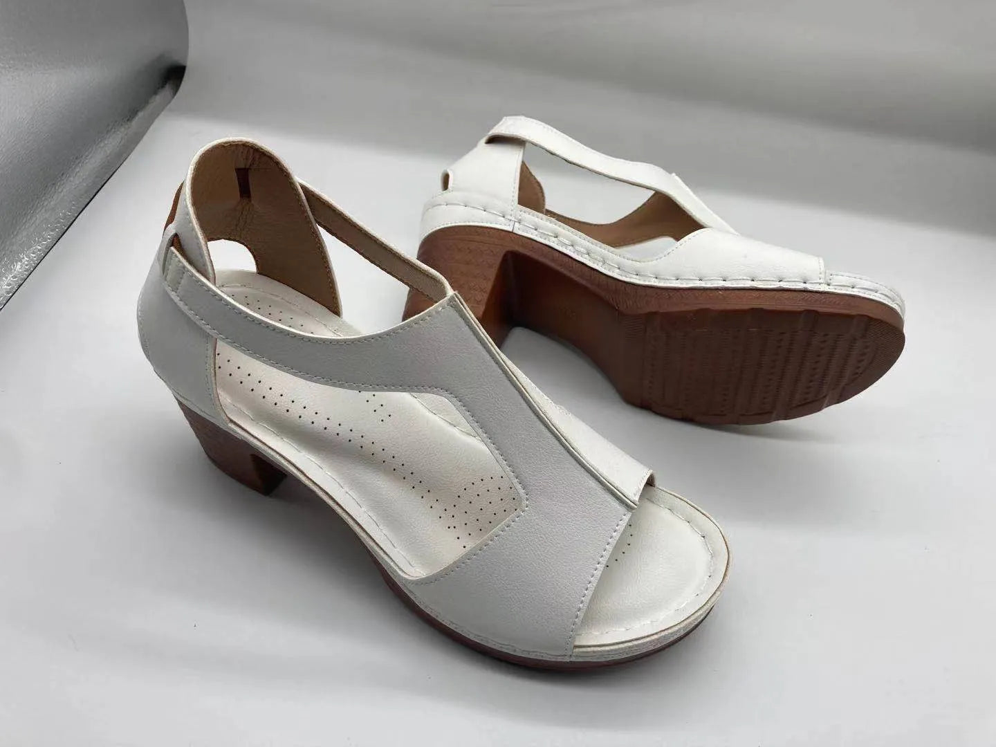 Plus size women's wedge sandals with peep toe, Roman buckle detail, and fish mouth design