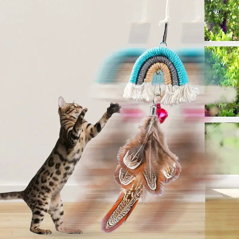 Colourful feather cat rope toy hanging from a door with elastic swing and sticky buckle clamp