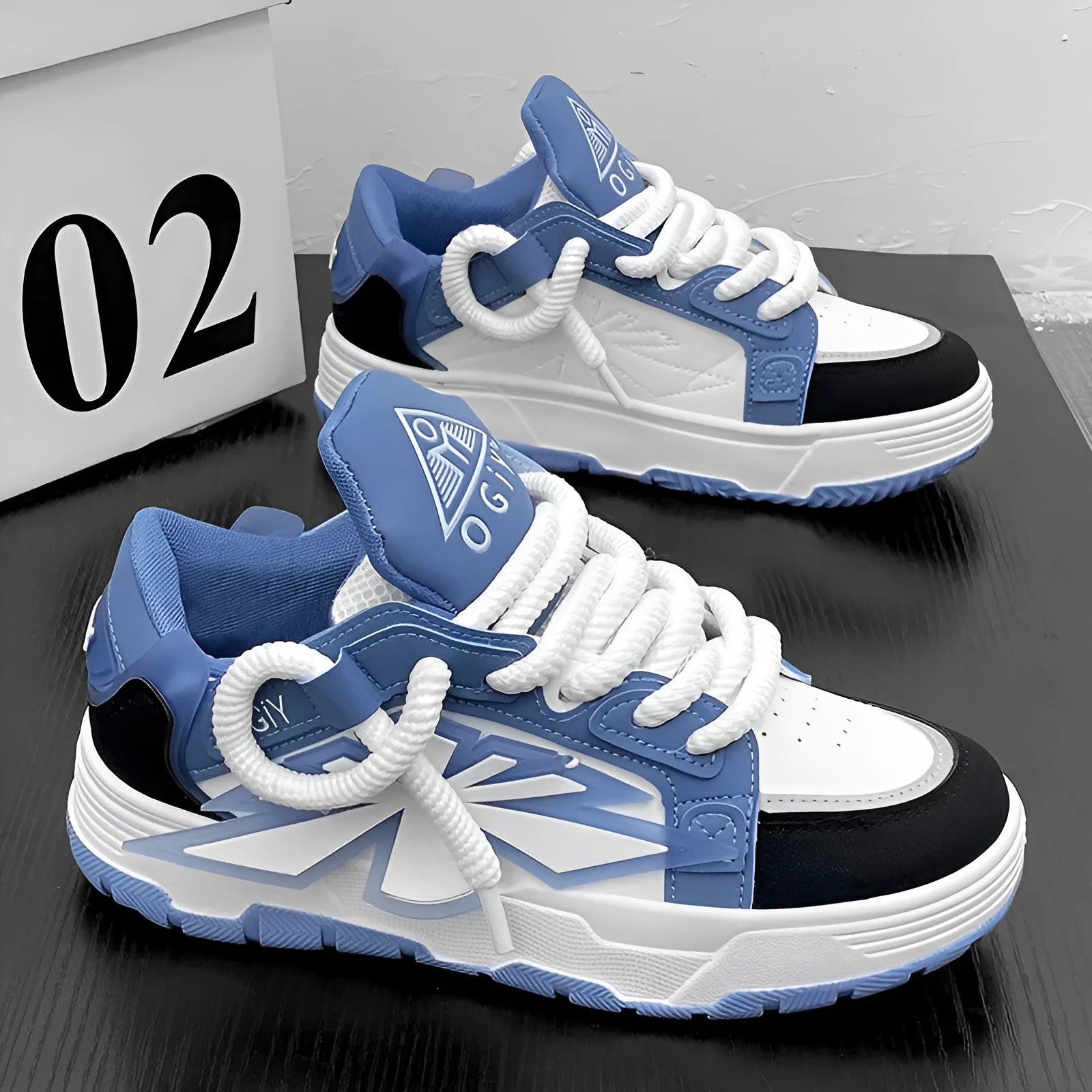 Men's white thick-bottom clunky sneakers with a round toe and lace-up front.