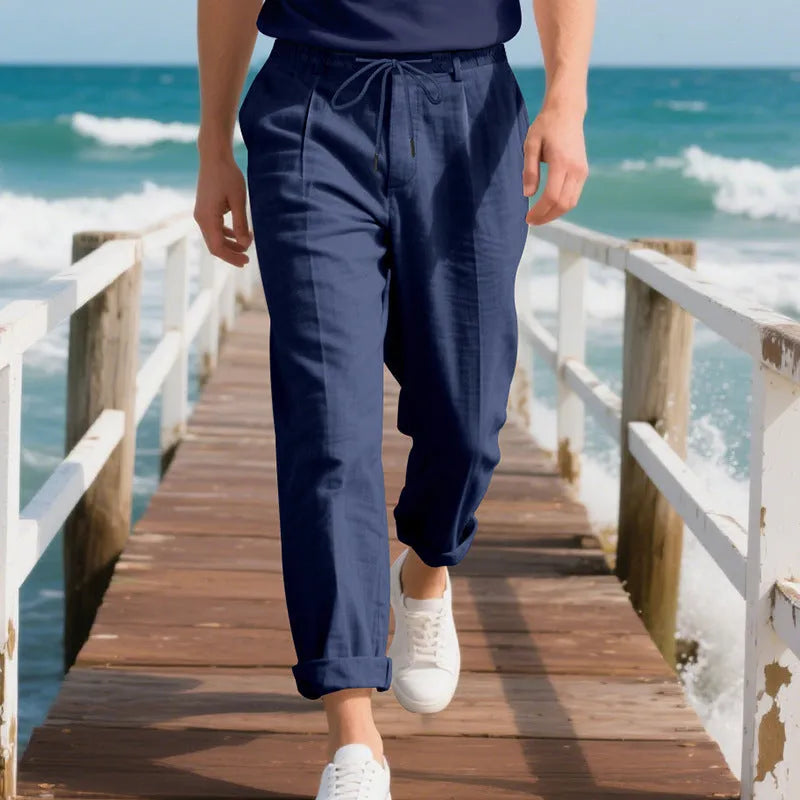Men's casual linen trousers in light khaki colour with drawstring waist and straight leg