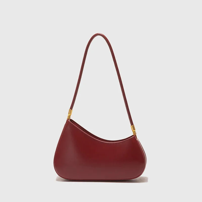 Women's retro oval PU leather shoulder bag in seven colour options with single strap and internal zipper compartment