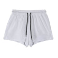 Men's black nylon quick-drying summer shorts laid flat, showing mid-waist and shorts length design.