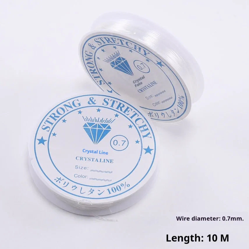 Roll of transparent white elastic fishing line cord for DIY jewellery making, showing six diameter size options.