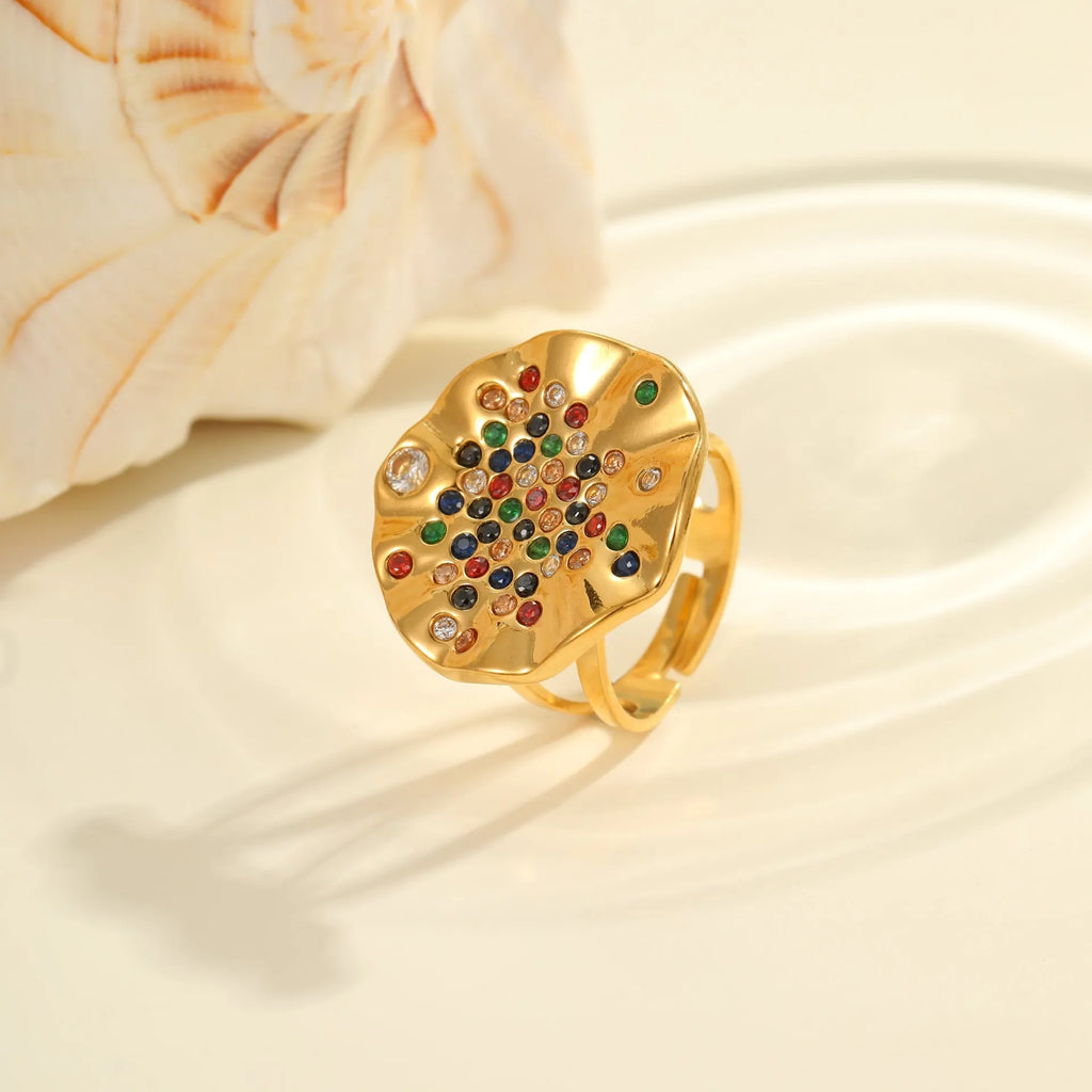 Geometric pleated stainless steel ring with inlaid colour diamonds and open mouth design