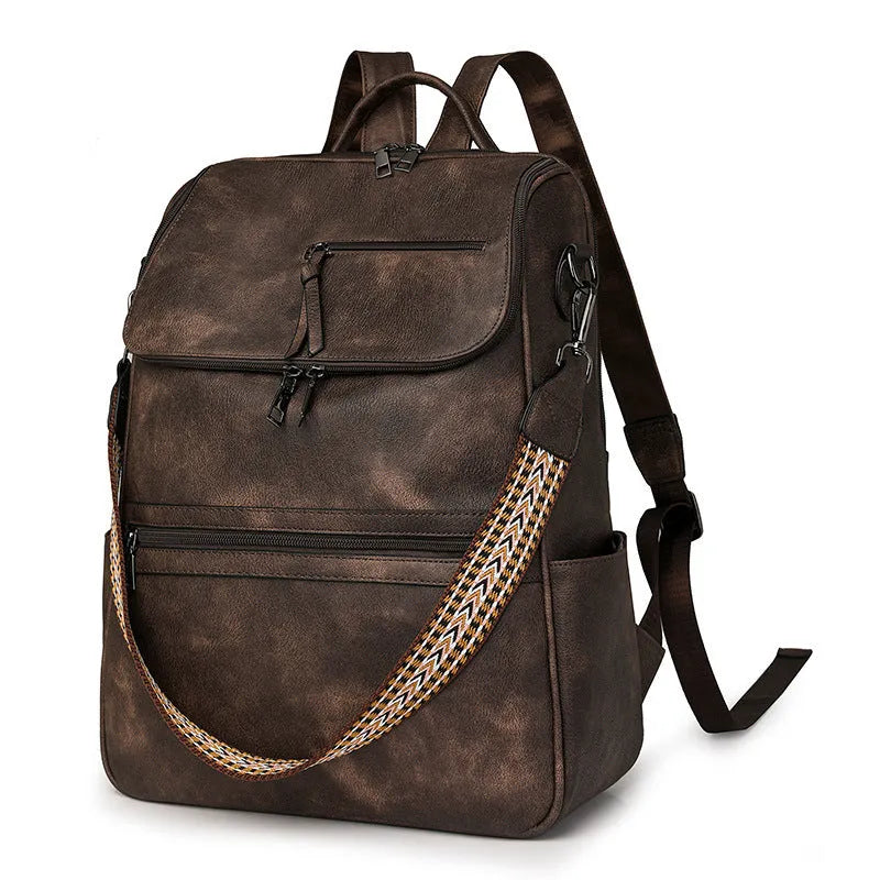 Retro college backpack in black PU leather with curved shoulder straps and stitching details