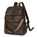 Retro college backpack in black PU leather with curved shoulder straps and stitching details