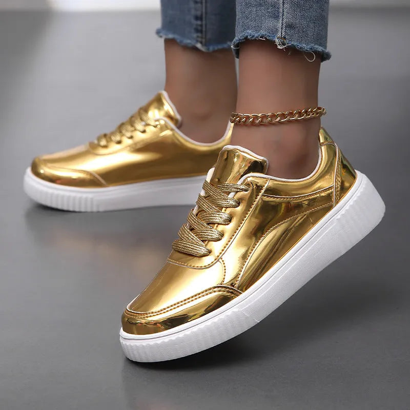 Gold sequinned platform sneaker with round toe and thick MD sole.
