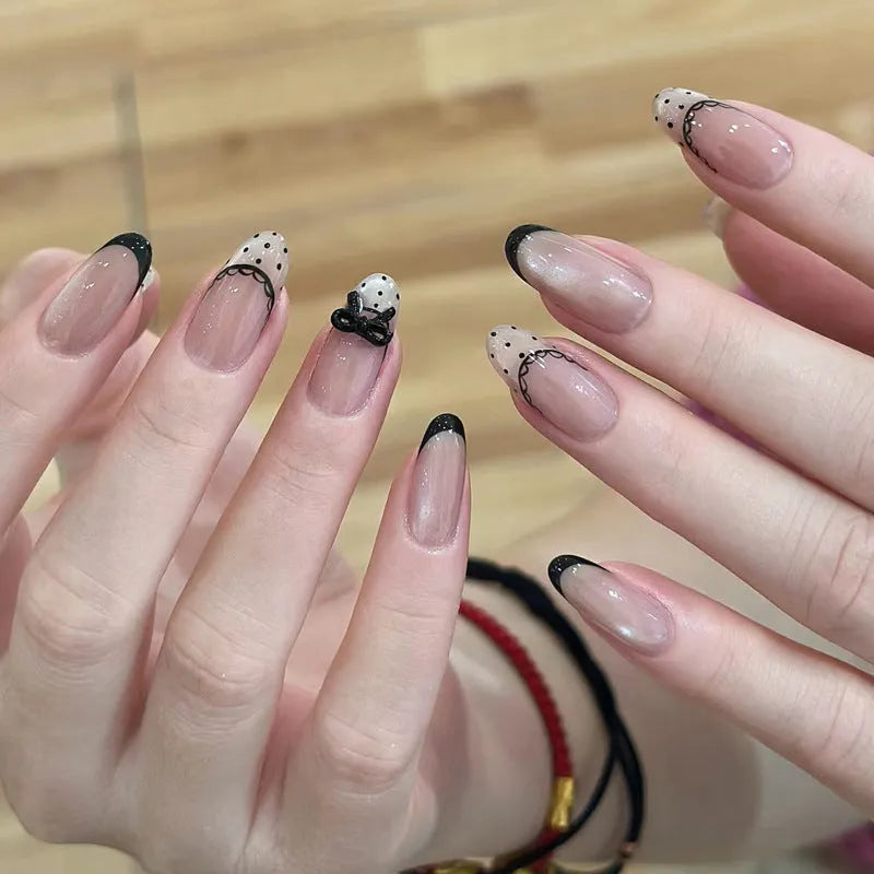 A set of artificial press-on false nails for women in assorted random colours and patterns.