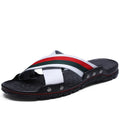 Men's white cowhide leather flip-flop sandals with a PU sole, shown from a side angle.