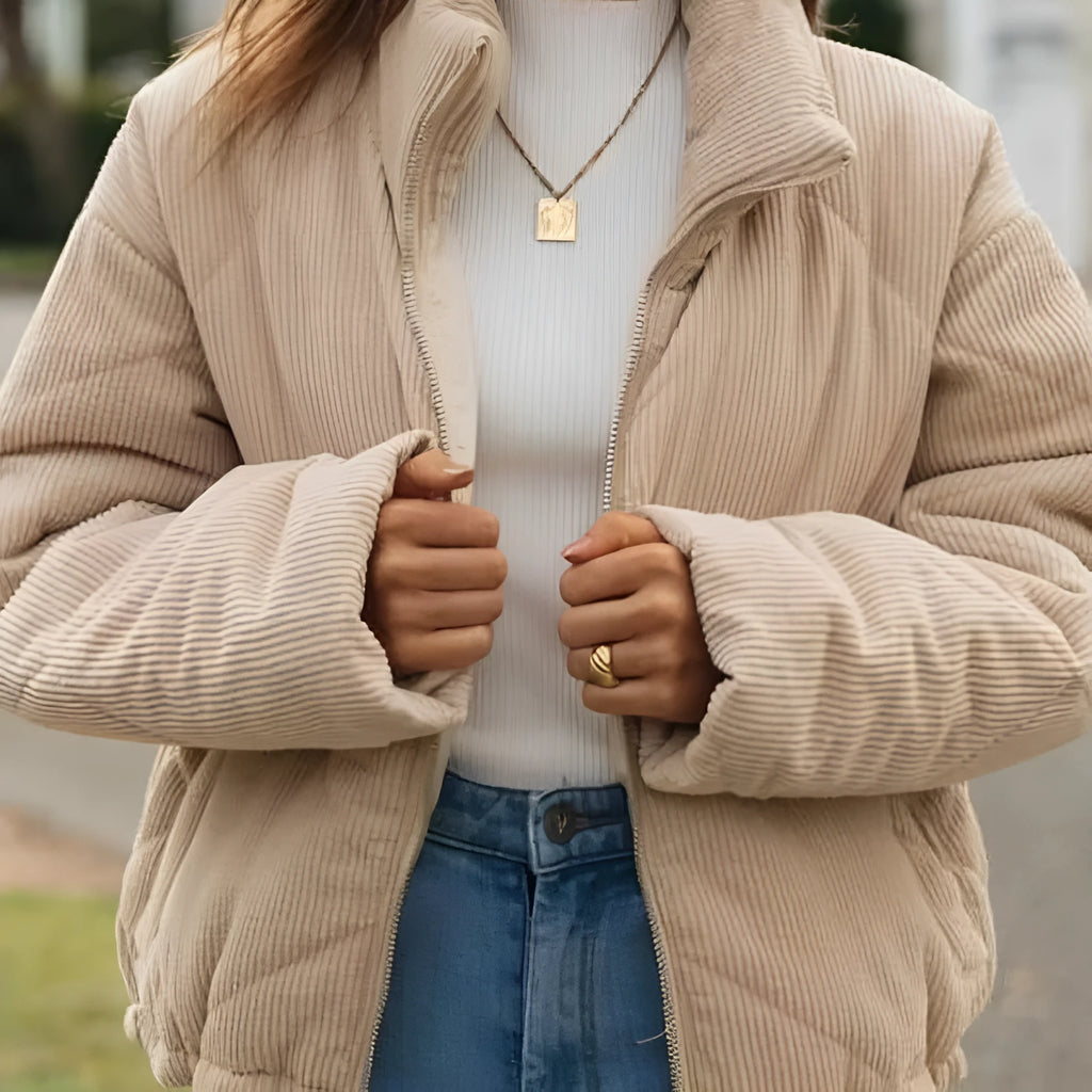 Women's apricot corduroy jacket with wadded quilting, stand collar, and zip-front closure