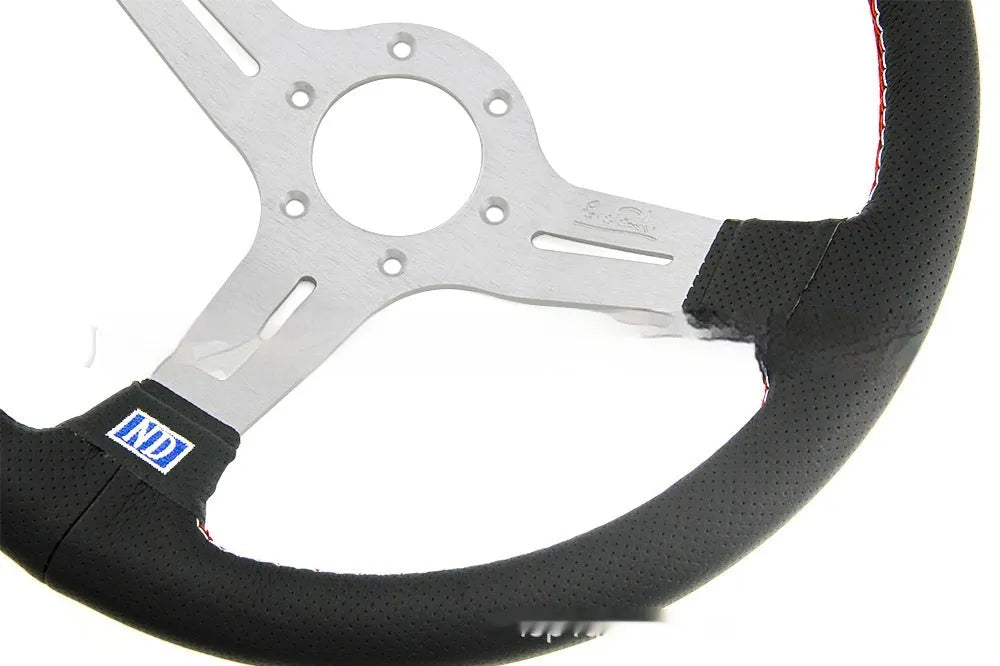 14-inch leather steering wheel with concave rim and black metal skeleton frame