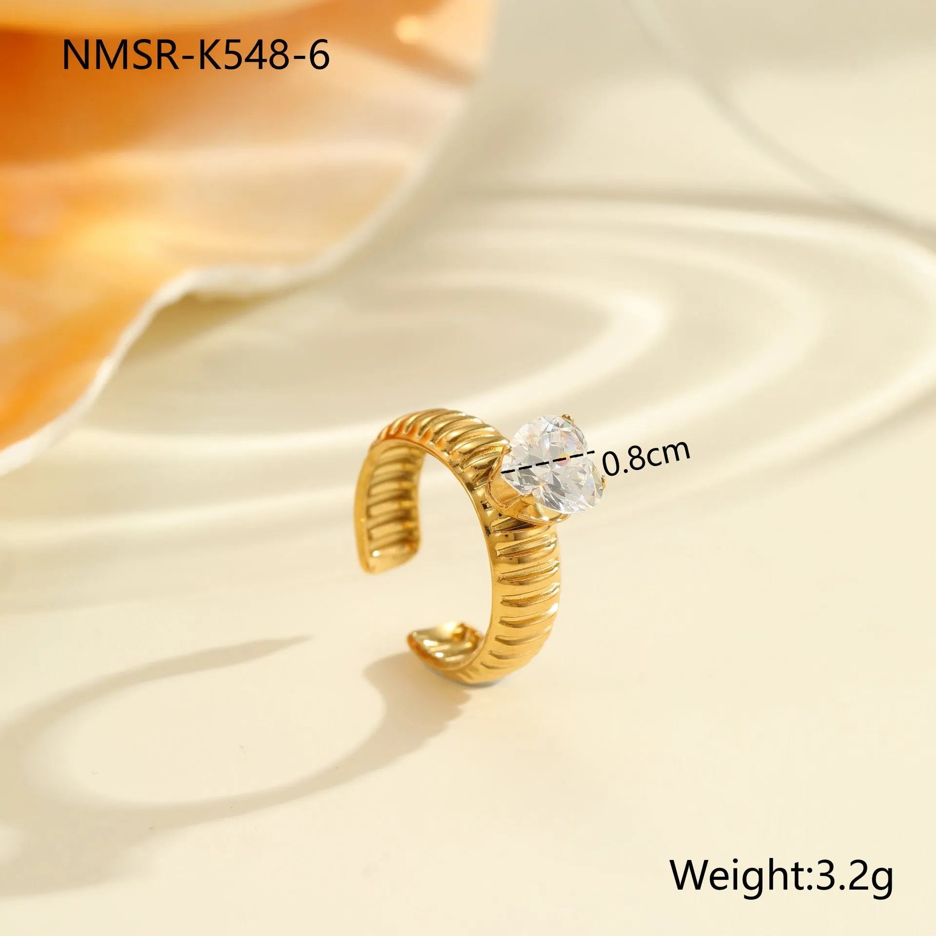 Open mouth geometric stainless steel ring with heart drop shape and gold inlaid zircon.