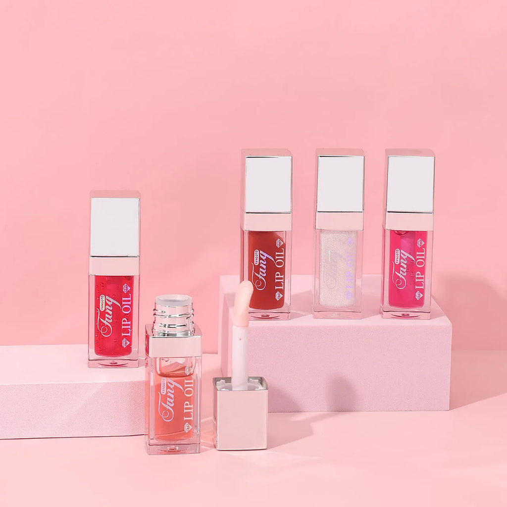 Five shades of moisturising lip gloss mint lipstick with included lip essence oil.