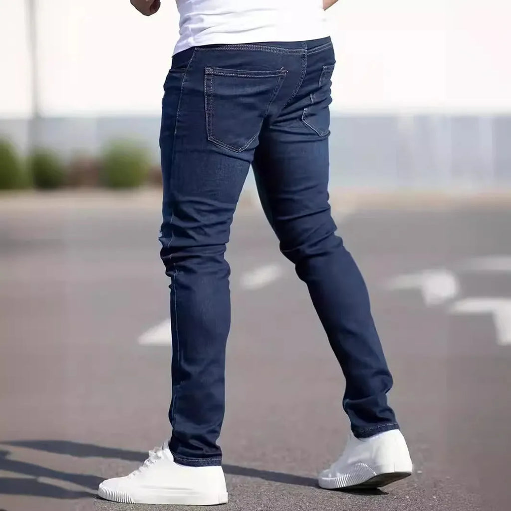Men's dark blue slim casual jeans with skinny leg style and mid-waist cut