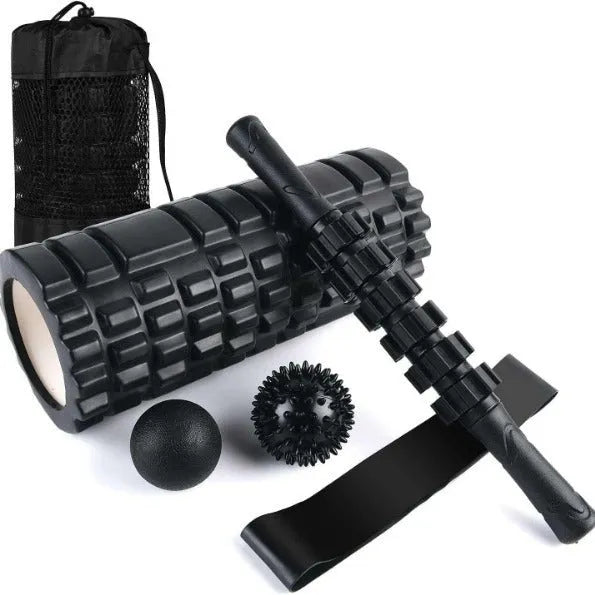 33cm long black foam roller massage stick with six raised gear pieces along its shaft.