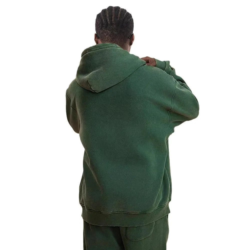 Men's vintage-style hooded cardigan sweater with a double zipper and fleece lining in a washed dark green colour.