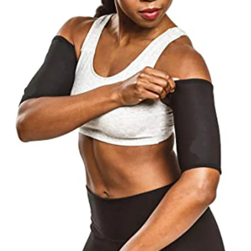 Blue and silver sports arm sweatband shown on an arm, with packaging showing black and red colour option.