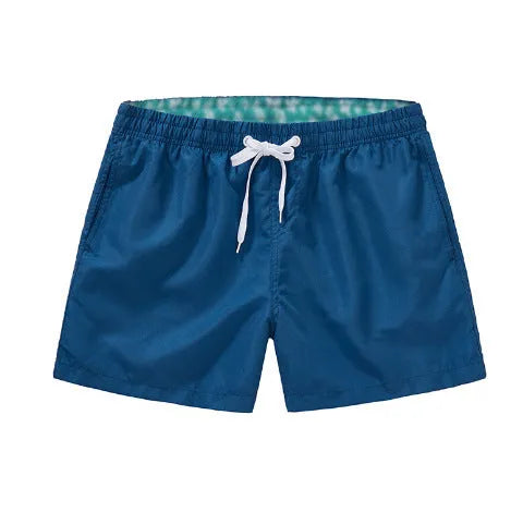 Men's plus size straight-leg beach shorts in multiple colours on a size chart.