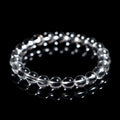 Natural white crystal bead bracelet with geometric design and round beads in various sizes.