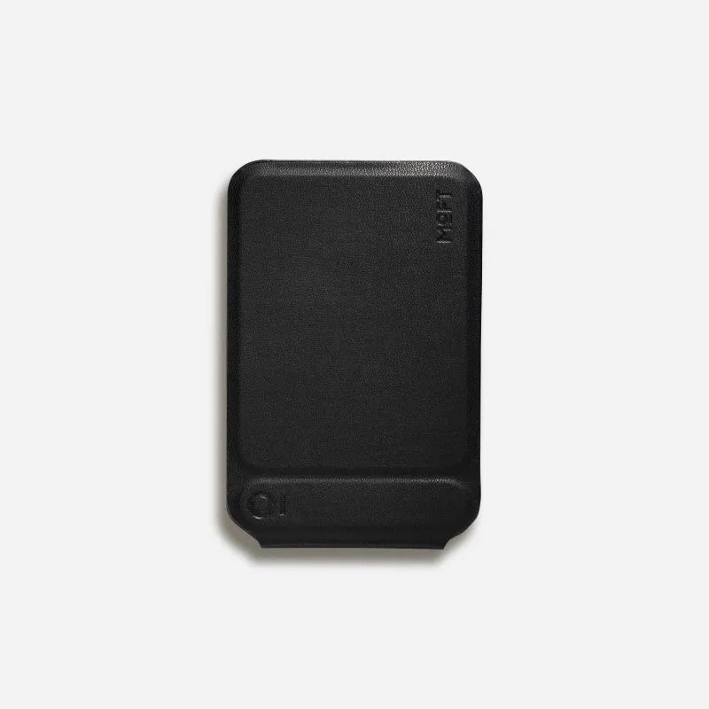 Black magnetic mobile phone case with integrated kickstand deployed, showing slim profile and leather finish.