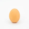 Green durable rubber dog chew ball toy with sound simulation egg inside for teeth cleaning.