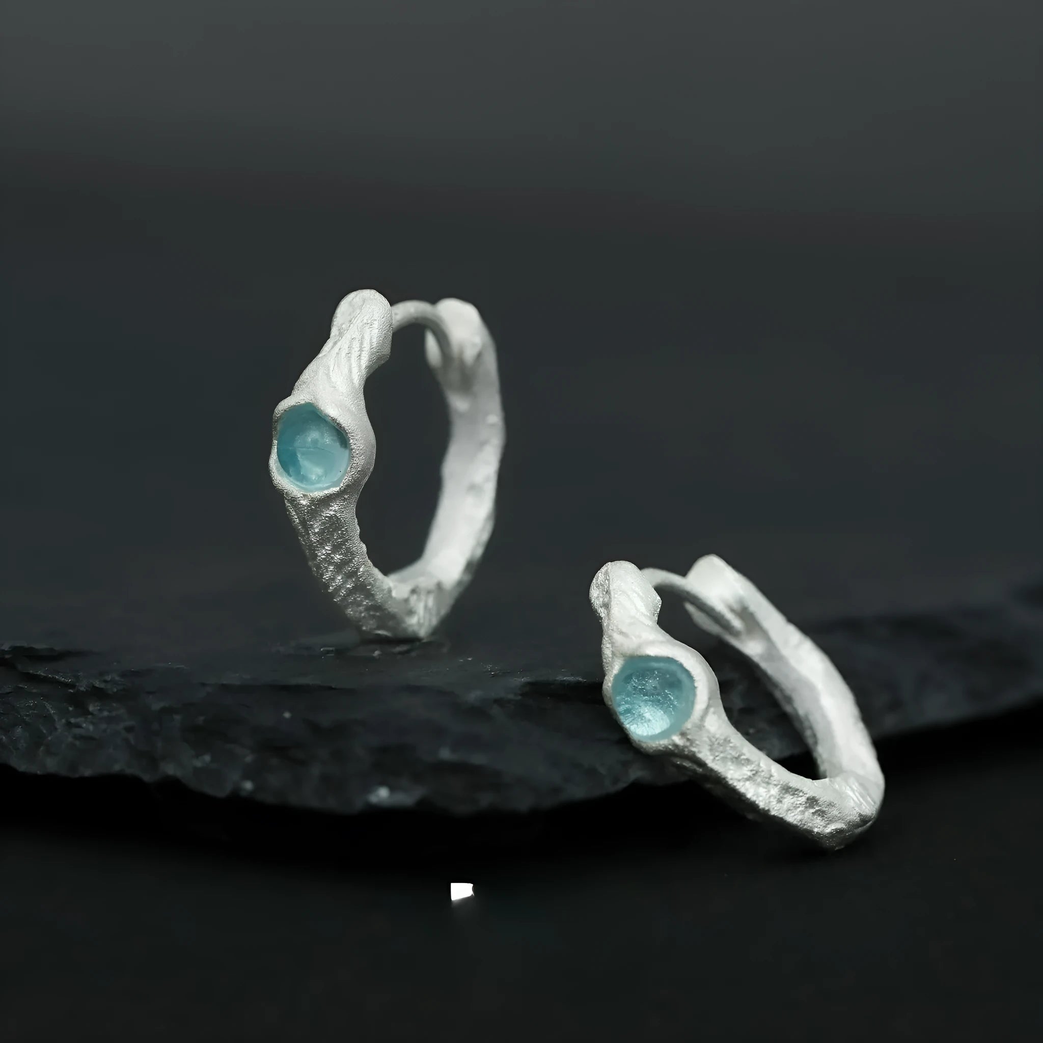 925 sterling silver ear clips with burnt silver finish and geometric circular design