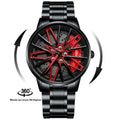 Three-dimensional hollow forged men's quartz watch with all-black rotating bezel and red steel belt on wrist