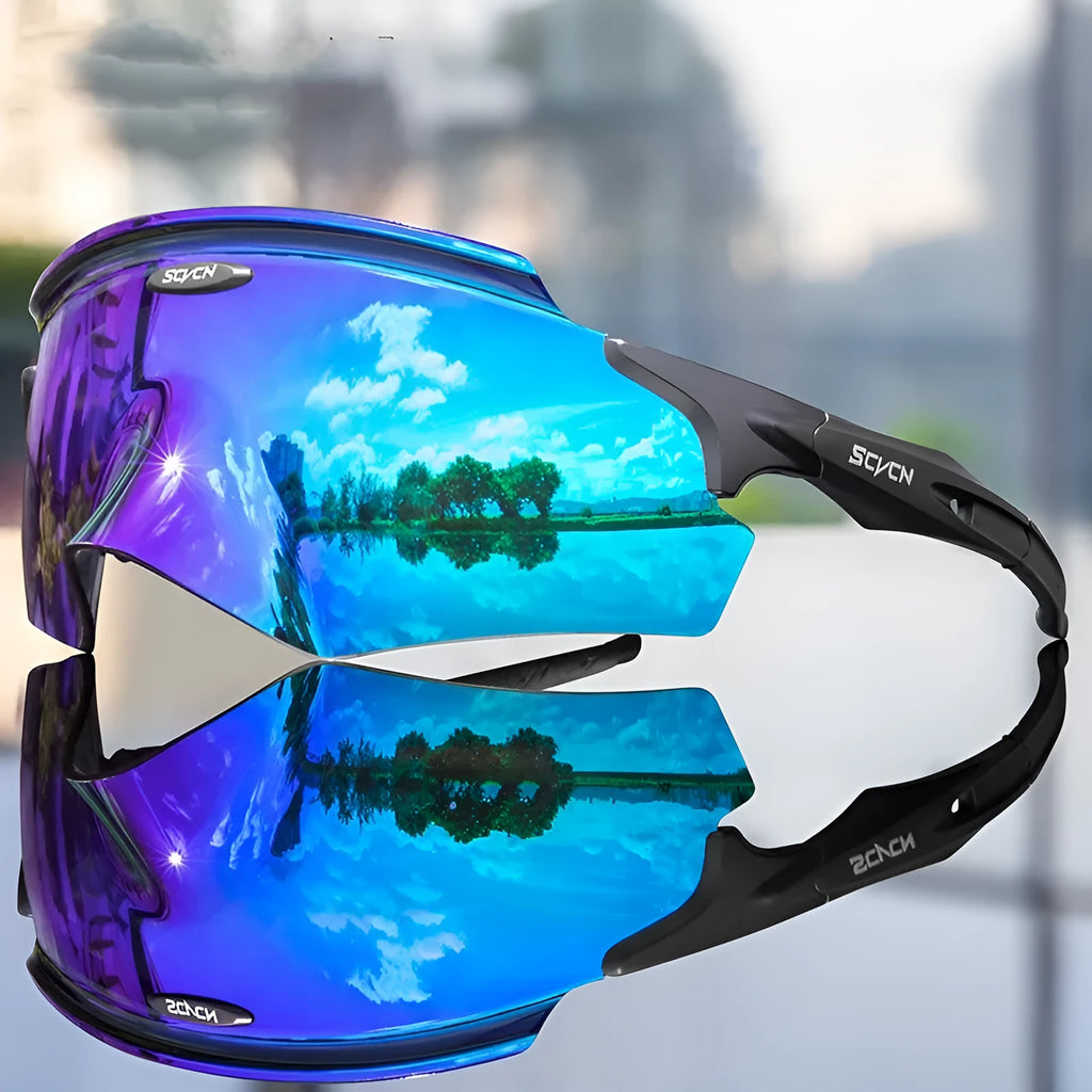 Frameless windproof sports goggles with a colourful integrated lens, shown in multiple style colours.