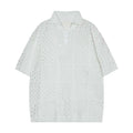 Loose fit short-sleeved knitted polo shirt with hollow design in solid black or white for teenagers