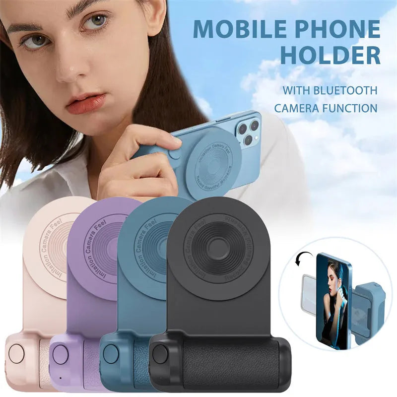 Black magnetic phone camera grip with rotatable bracket and ergonomic PU leather handle on a table.