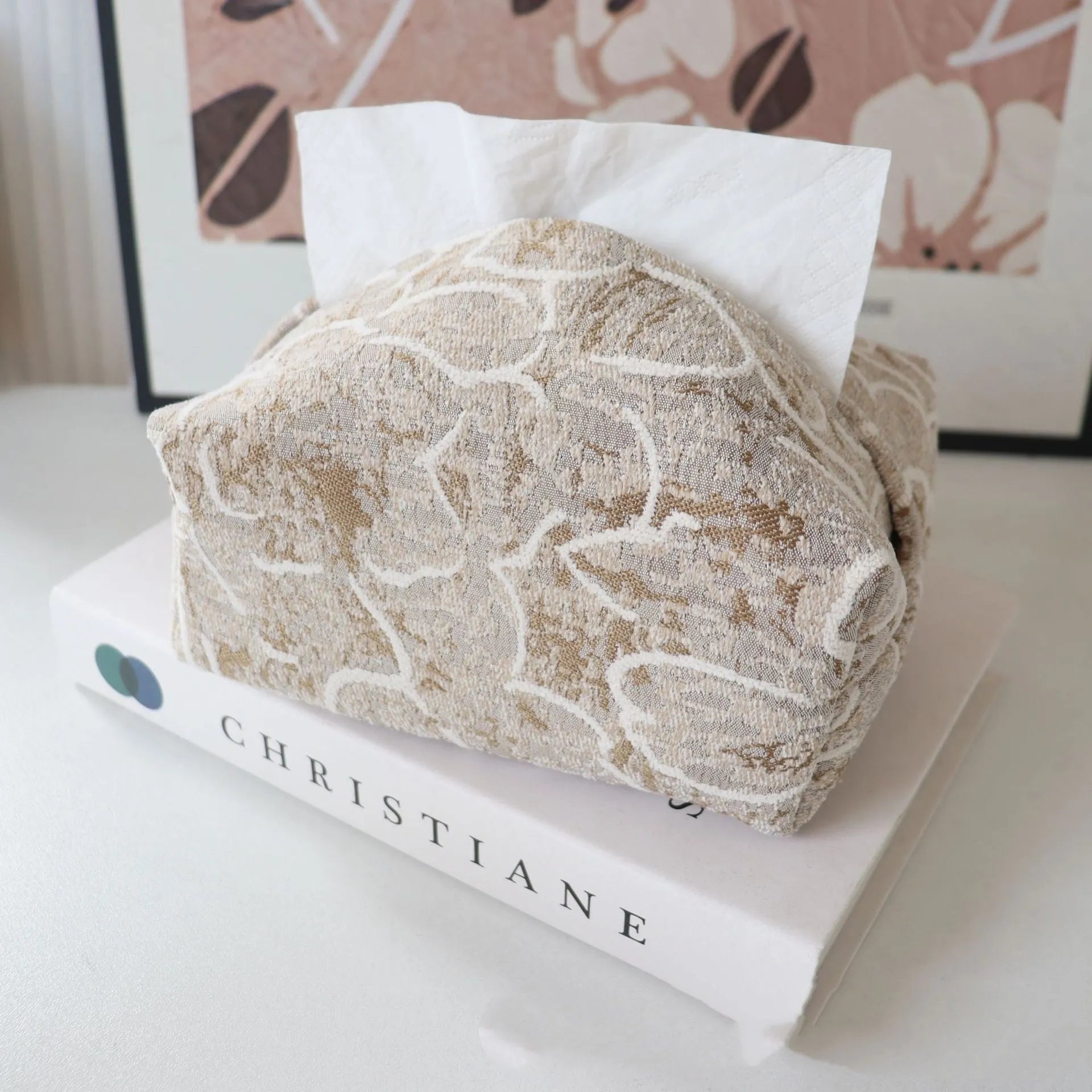 Cotton floral tissue box in beige, blue, or brown on a wooden table.