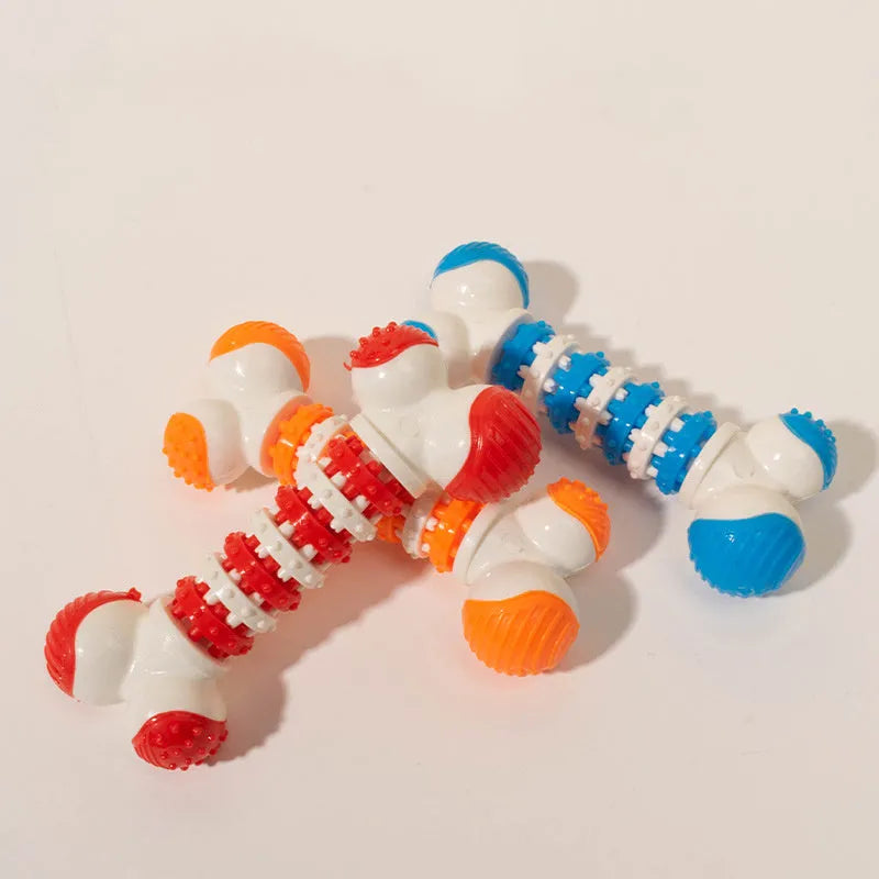 Small dog bone chew toy with treat dispenser centre in blue, orange and red colours