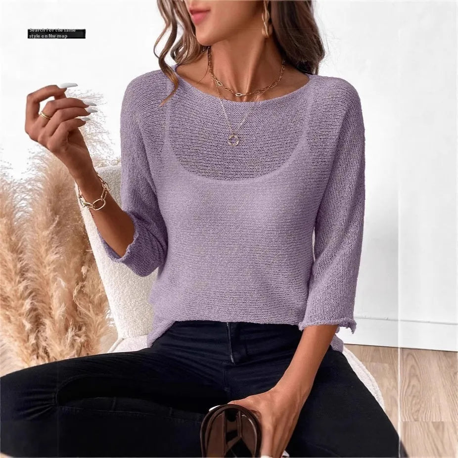 Women's off-shoulder knitted pullover top in lavender purple with a 3D pattern and 3/4 length sleeves.