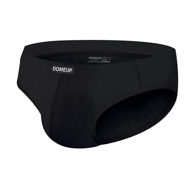 Men's solid colour low-waist briefs in black, shown flat, highlighting seamless construction.