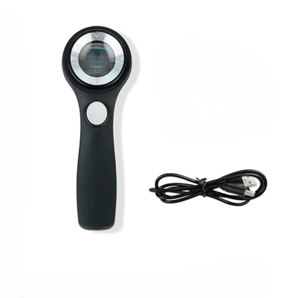 Black and silver metal 30x magnification appraisal magnifying glass with optical glass lens and USB C cable.