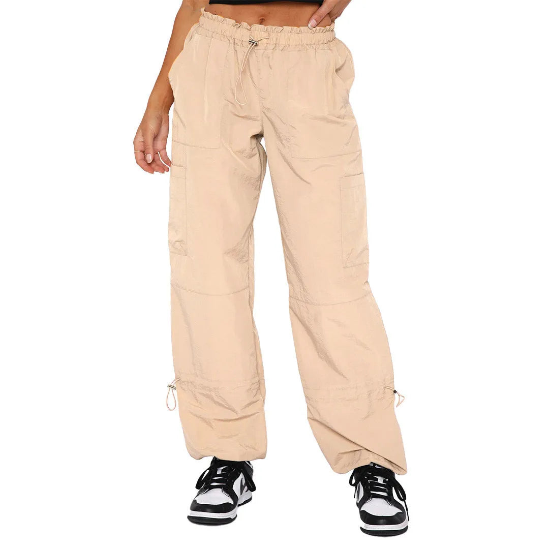 Men's straight-leg cargo trousers in khaki with multiple pockets, showing loose fit and mid-waist design