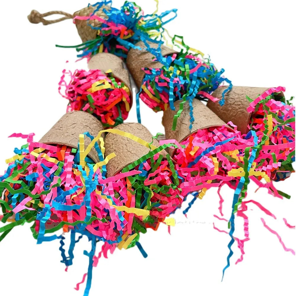 Parrot chew toy with woven palm fibres and a paper cup, hanging 38 cm long in a natural wood colour.
