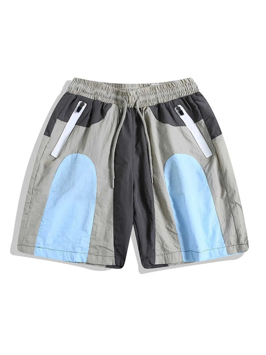 Blue patchwork quick-drying outdoor shorts with loose straight-leg design and elastic waistband