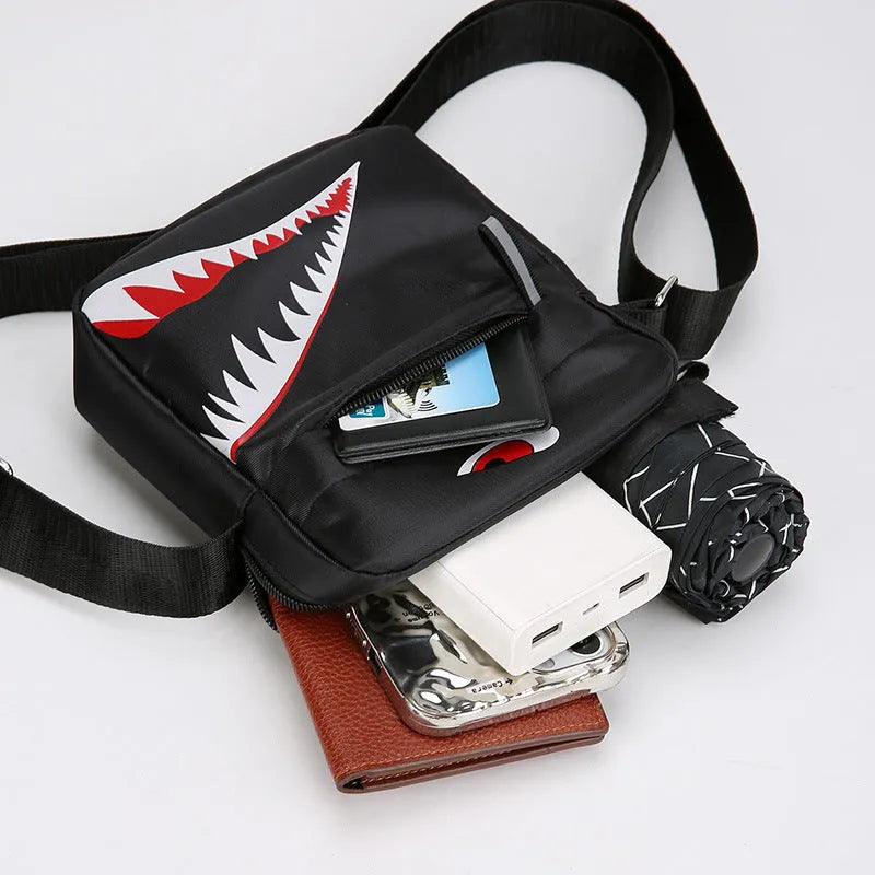 Men's small casual crossbody bag in Oxford cloth with animal print patterns in black colour option